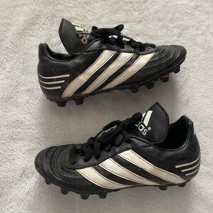 Kids size 2.5 Adidas Black and White Striped Cleats